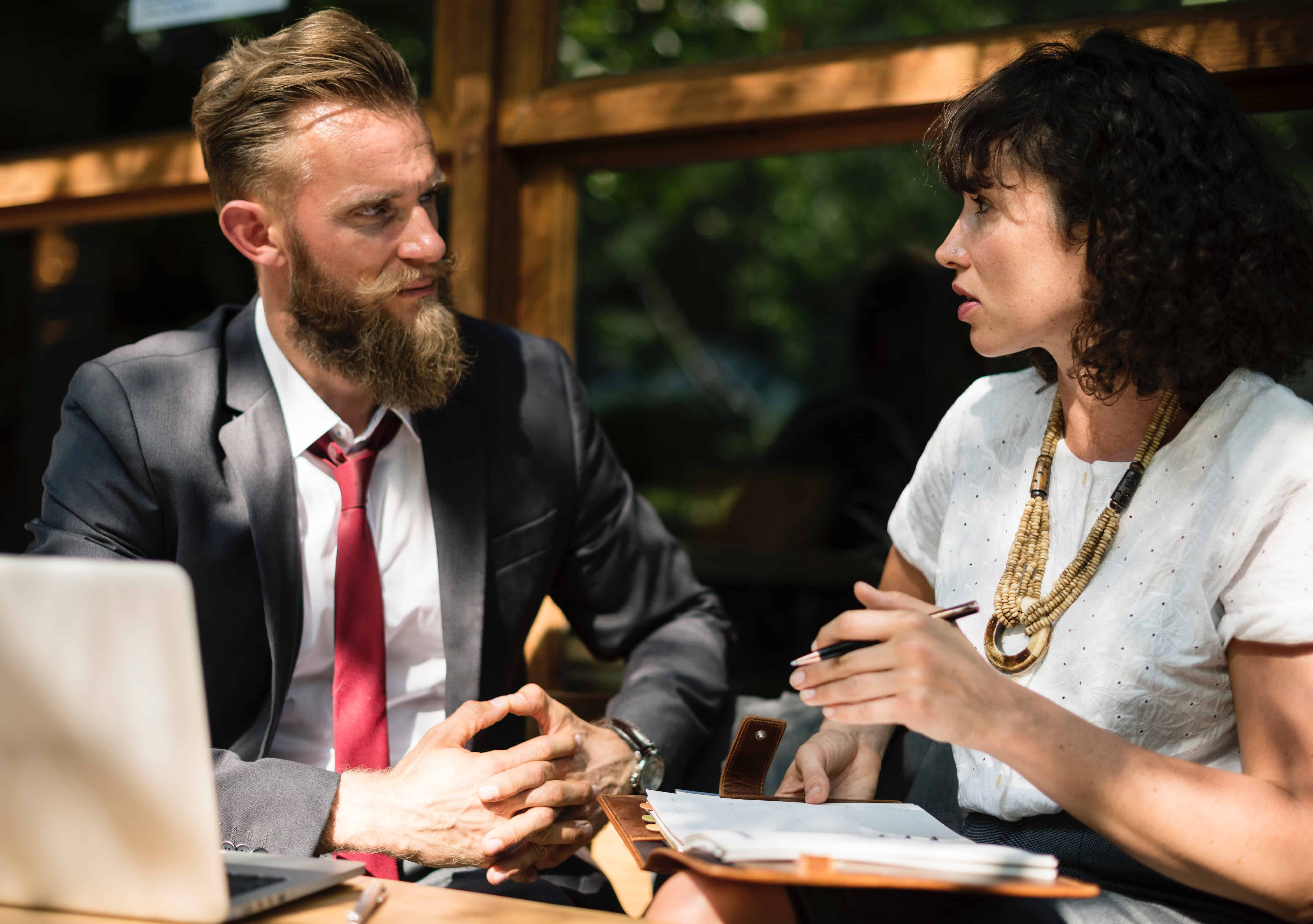 A man interviewing an applicant